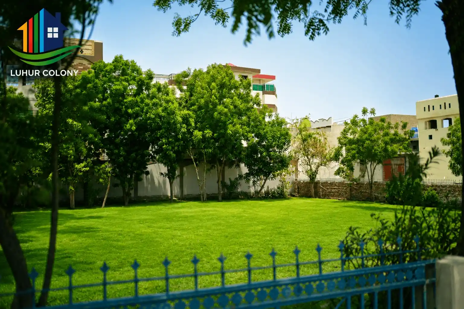 Landscaped family park inside Luhur Colony with green lawns