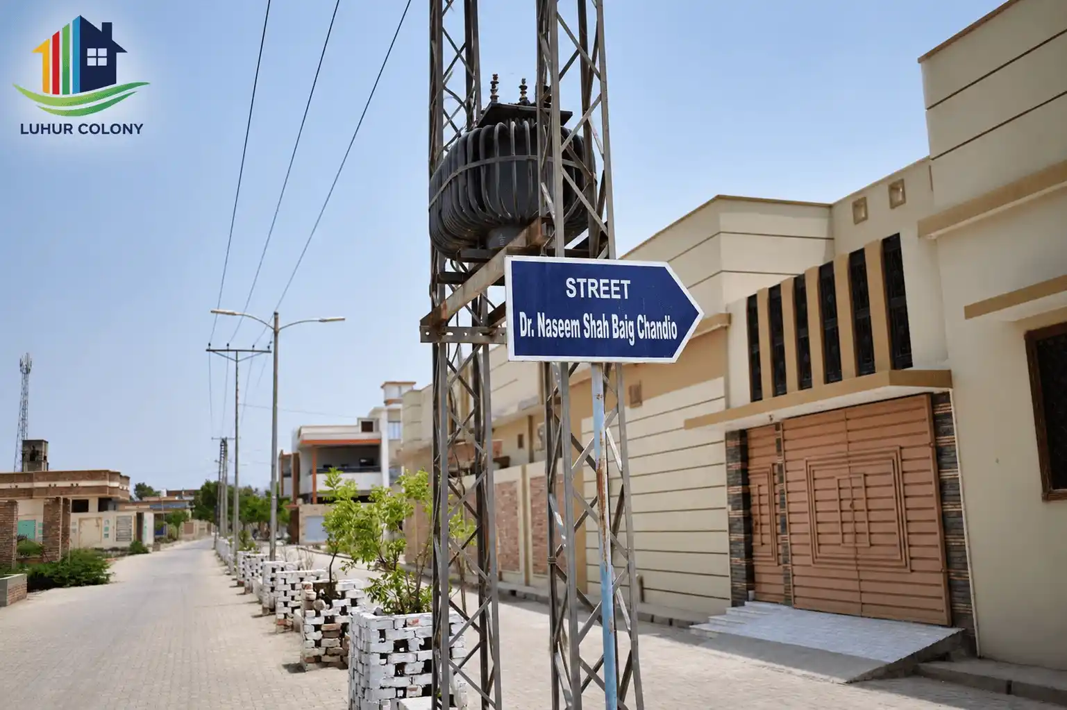 Clean residential street inside Luhur Colony, view one