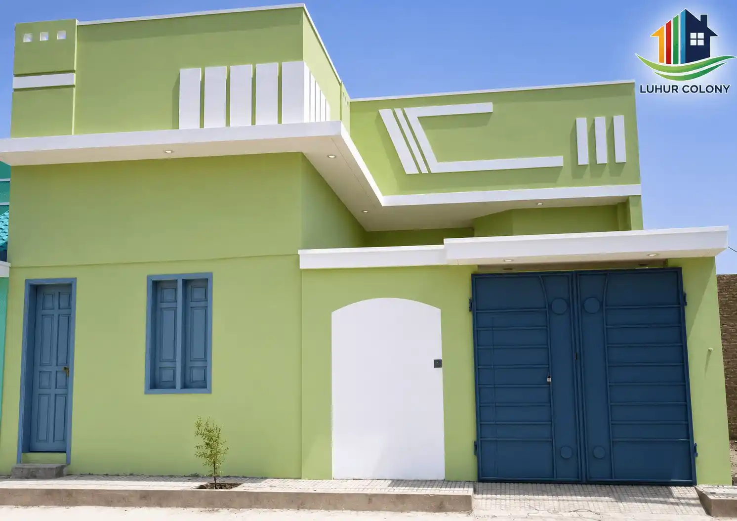 Luhur Colony villa exterior with modern gated-community architecture, front view