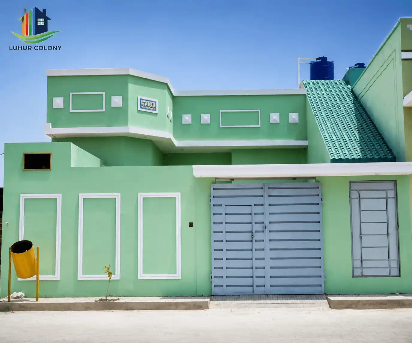 Luhur Colony villa exterior showing premium finishing and driveway